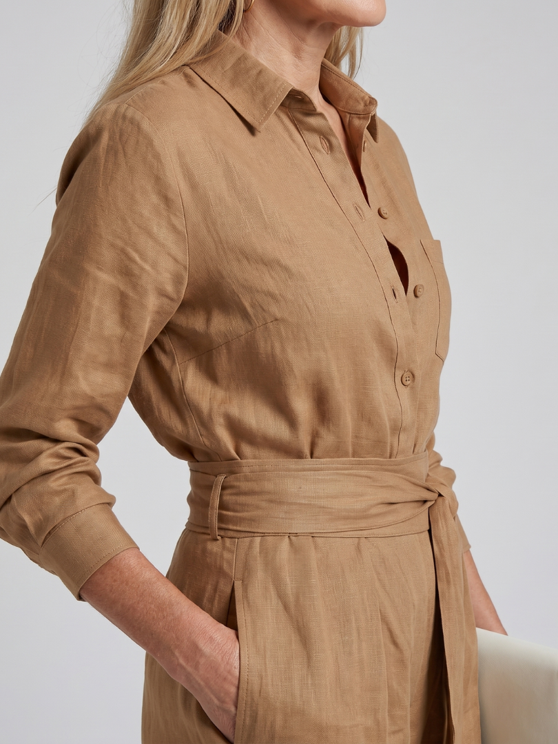 Jovie | Långärmad knäppning framtill jumpsuit med vida ben