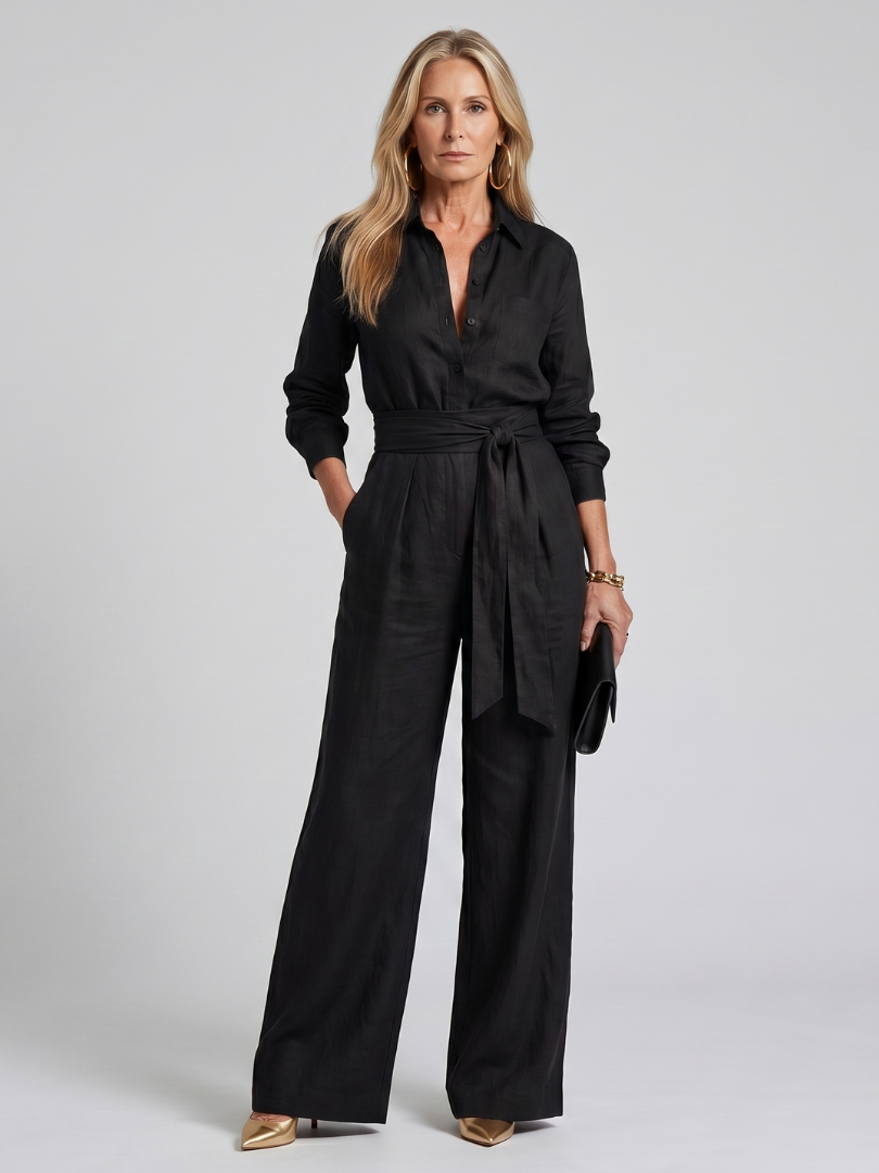 Jovie | Långärmad knäppning framtill jumpsuit med vida ben