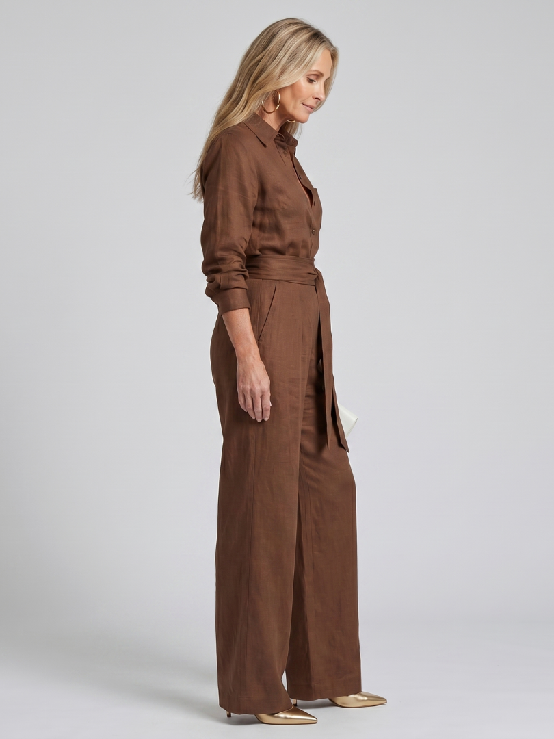 Jovie | Långärmad knäppning framtill jumpsuit med vida ben