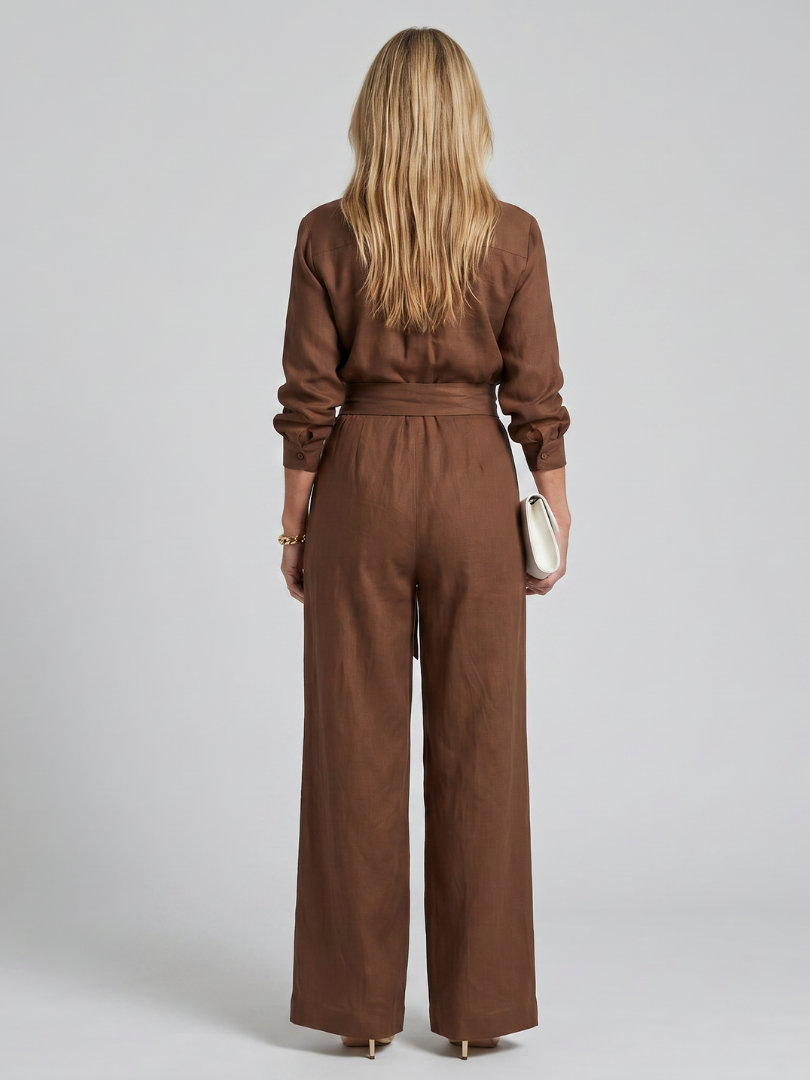 Jovie | Långärmad knäppning framtill jumpsuit med vida ben