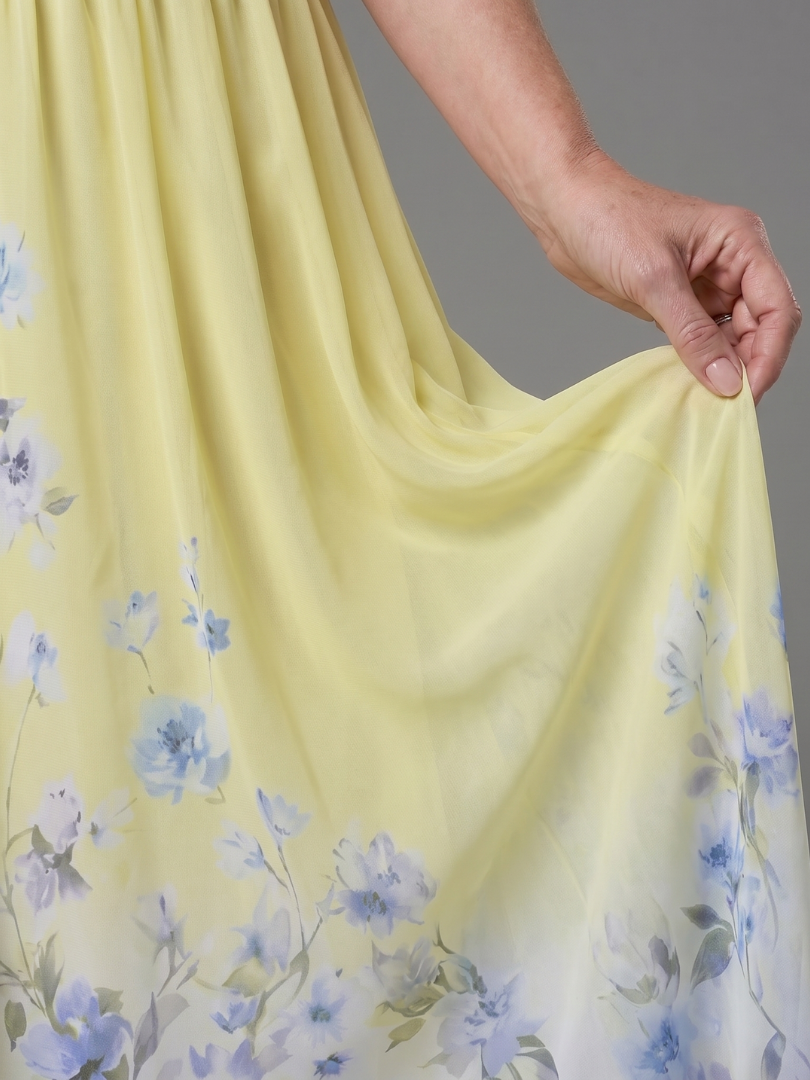Clarissa | Ärmlös v-ringning mjuk blommig fåll midiklänning