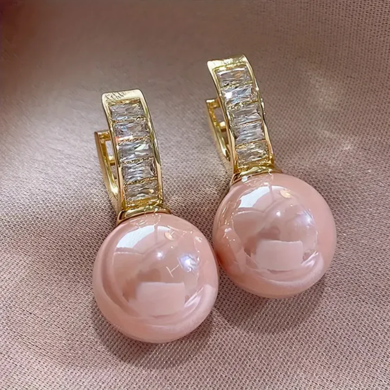 Guldörhängen med rosa pärla och zirkonia
